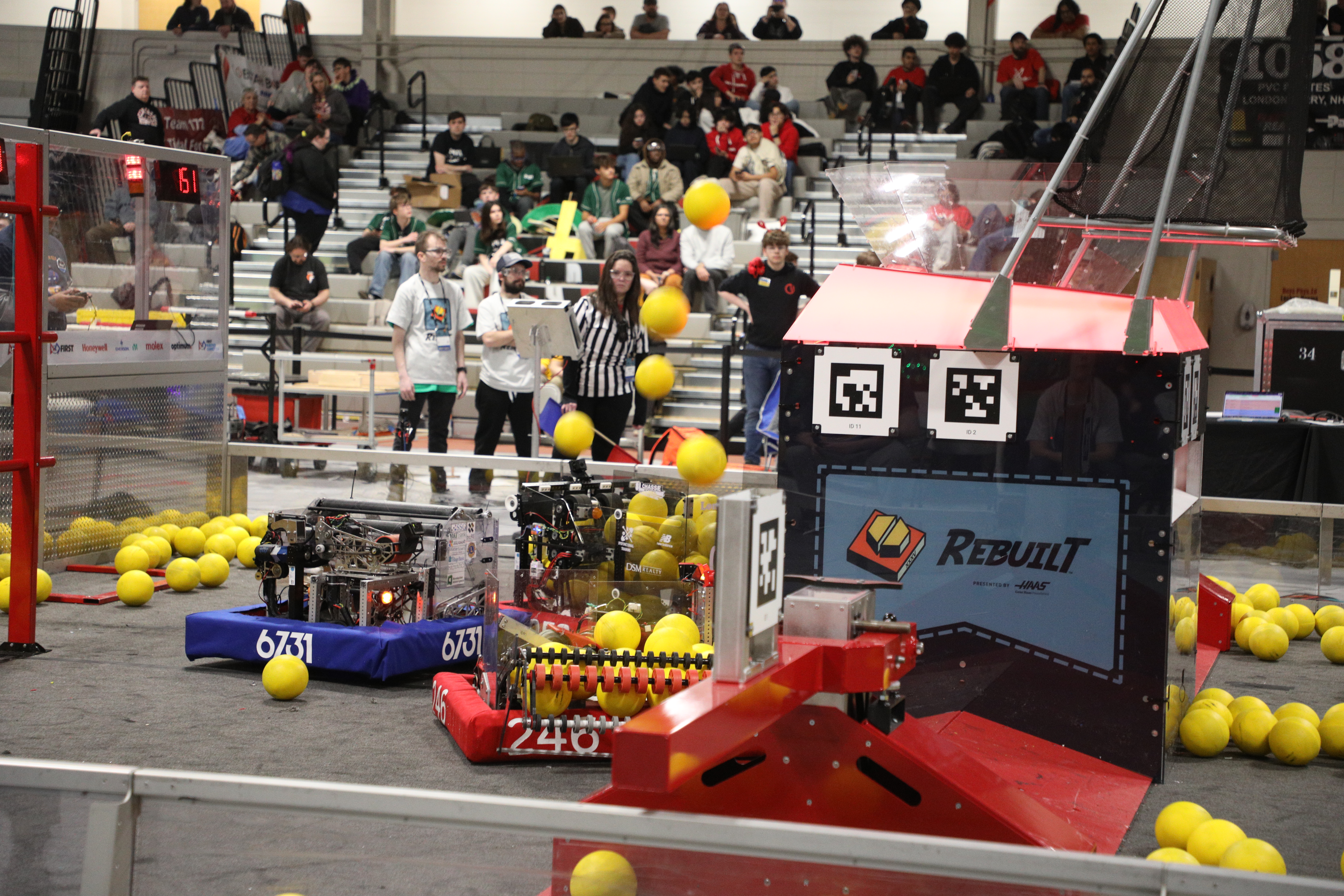 Pufferfish, our 2026 competition bot, hard at work scoring fuel (the REBUILT game pieces), during a momentous qualification round.